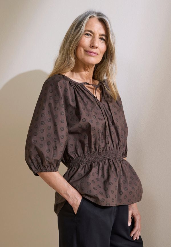 Blus med puffärm
