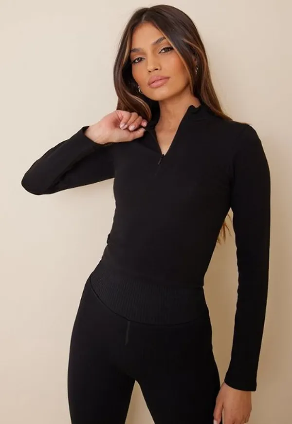 NLY Trend LS Sporty Zip Top Långärmade toppar Svart