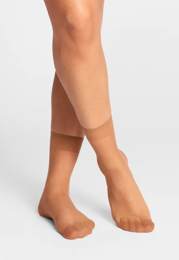 4-pack strumpor 20 denier