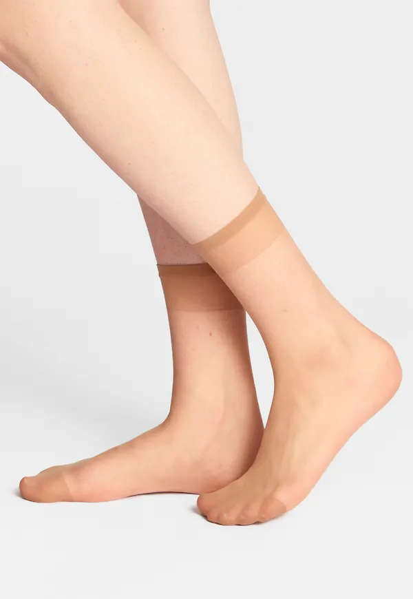 4-pack strumpor 20 denier