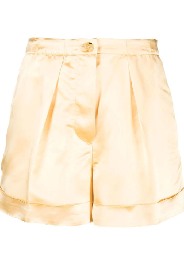 Acne Studios shorts med uppvikt fåll - Orange