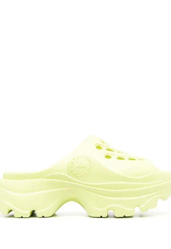 adidas by Stella McCartney perforerade träskor med präglad logotyp - Gul