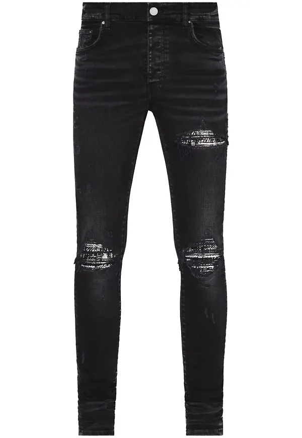 AMIRI Boucle MX1 slitna skinny-jeans - Svart