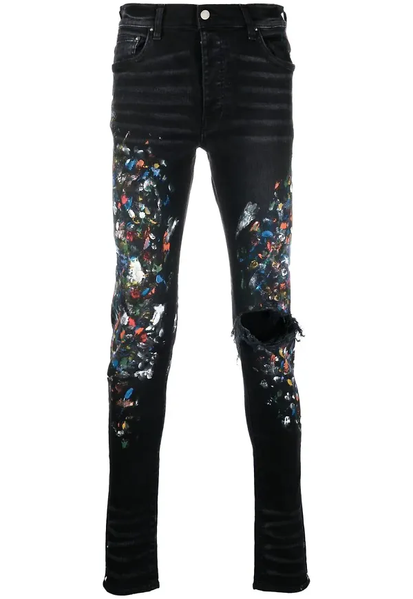 AMIRI slitna skinny-jeans med färgtryck - Svart