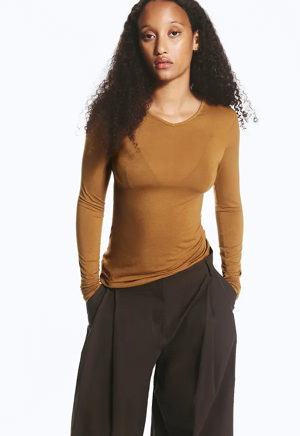 Anti-plunge V-neck top