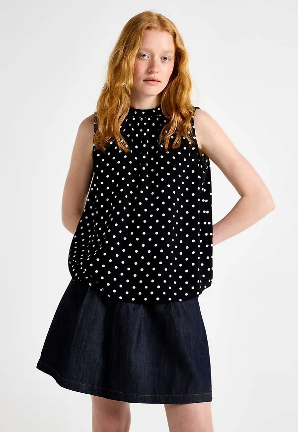 Ärmlös blus