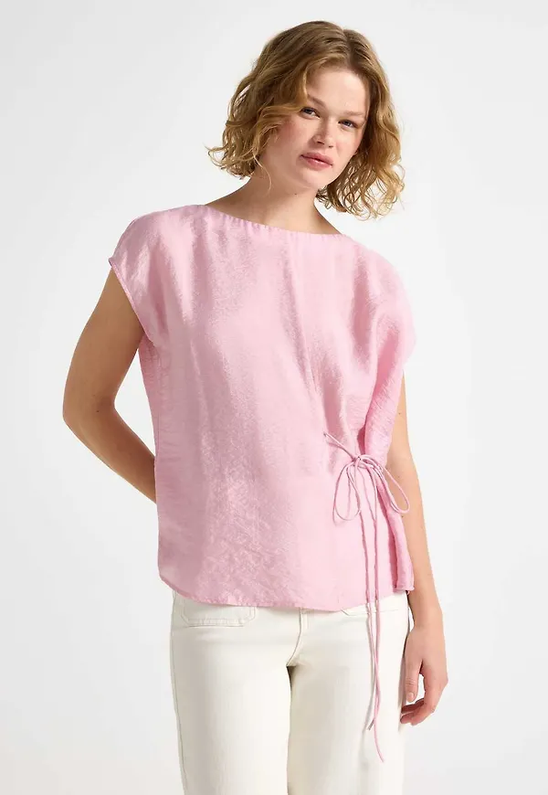 Ärmlös blus med knytband