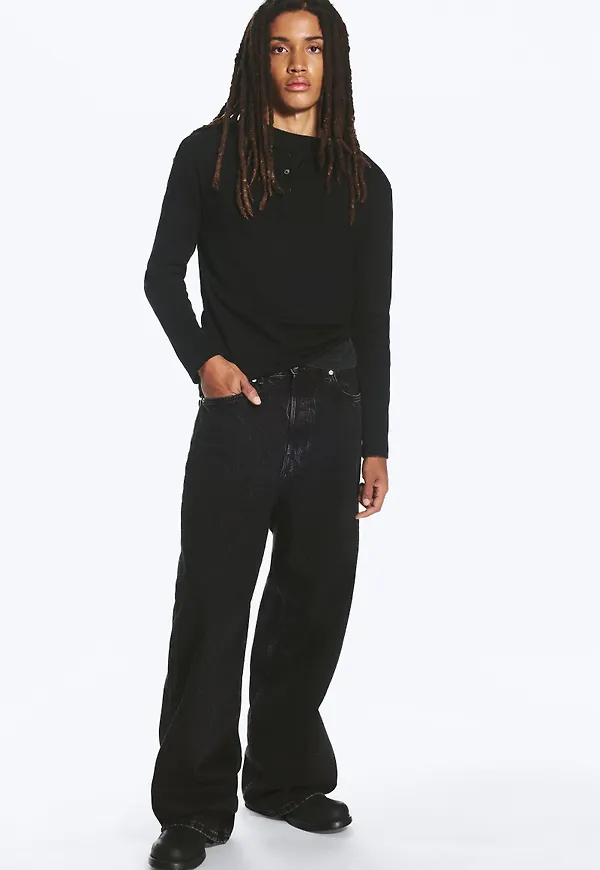 Astro Mid Rise Baggy Faux Leather Pocket Jeans