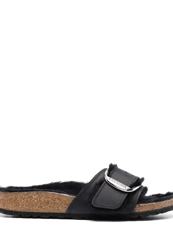 Birkenstock fårskinnsfodrade sandaler med spänne - Svart