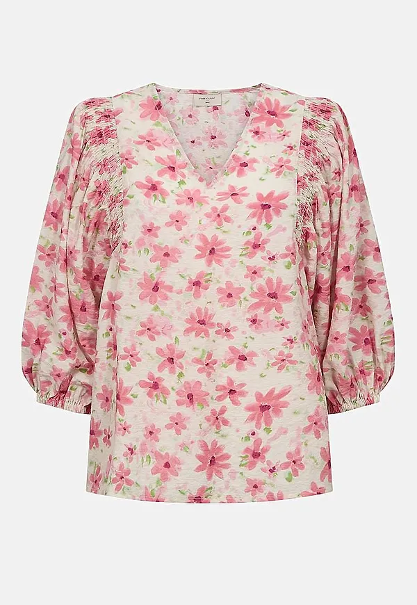 Blommig, vävd blus med smockdetalj