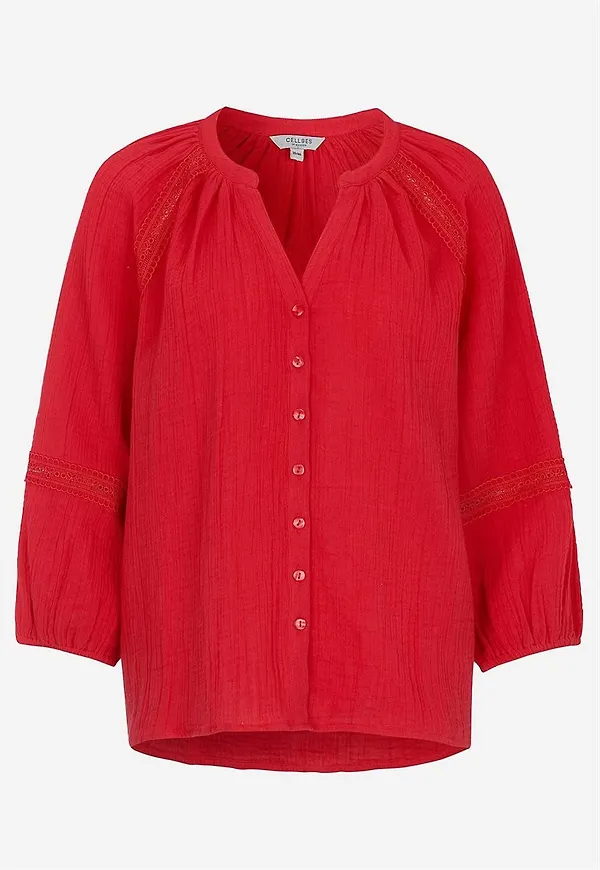 Blus i krinklad bomull