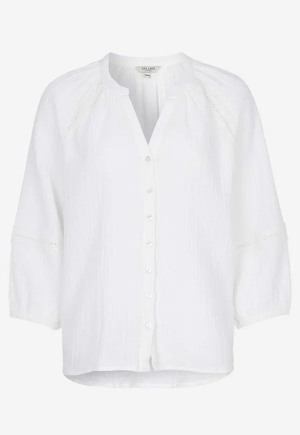 Blus i krinklad bomull