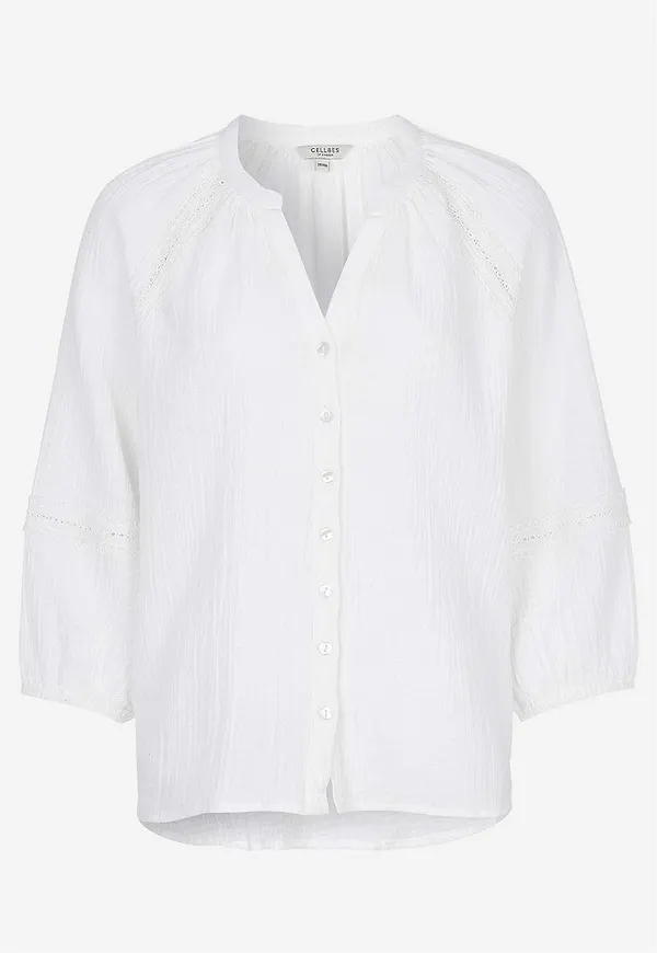 Blus i krinklad bomull