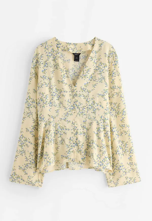 Blus med blommönster