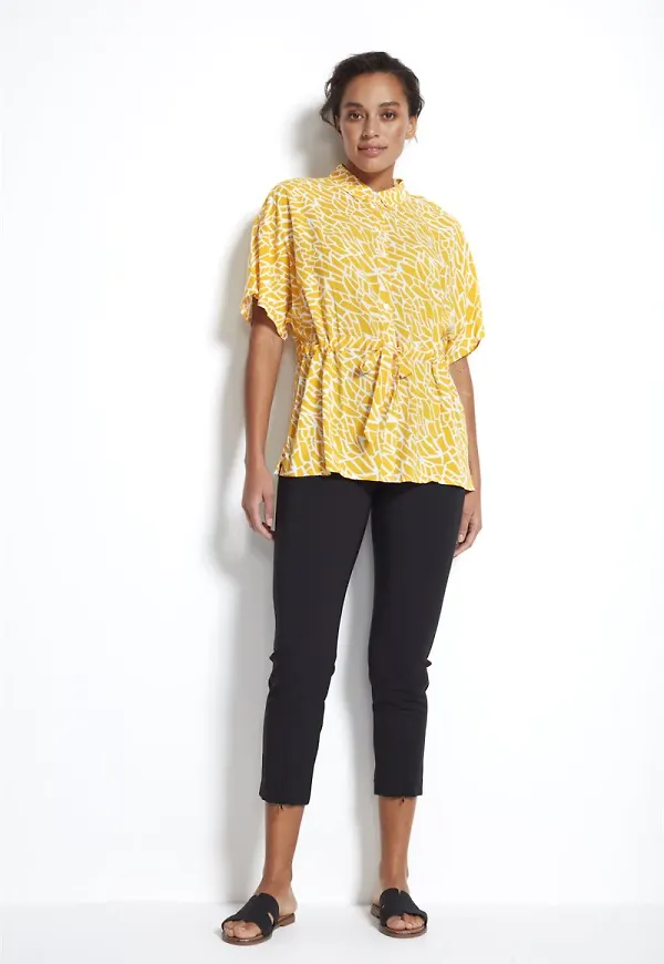 Blus med dragsko i midjan