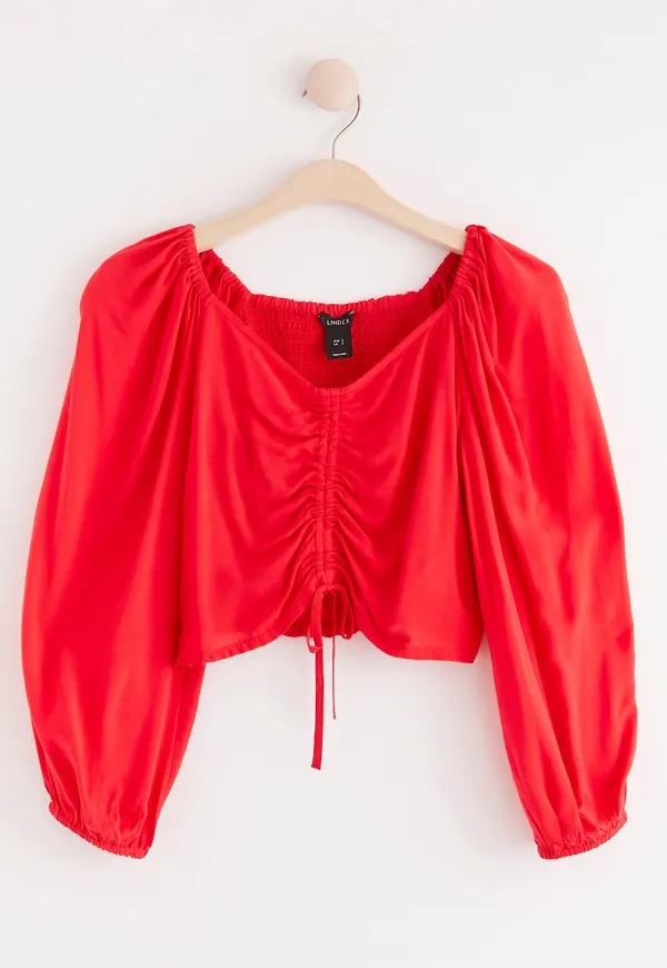 Blus med dragsko