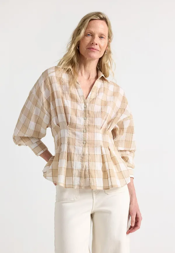 Blus med insvängd midja
