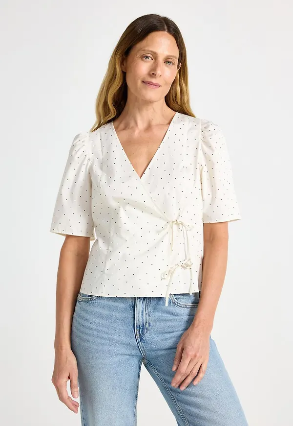 Blus med omlottdesign