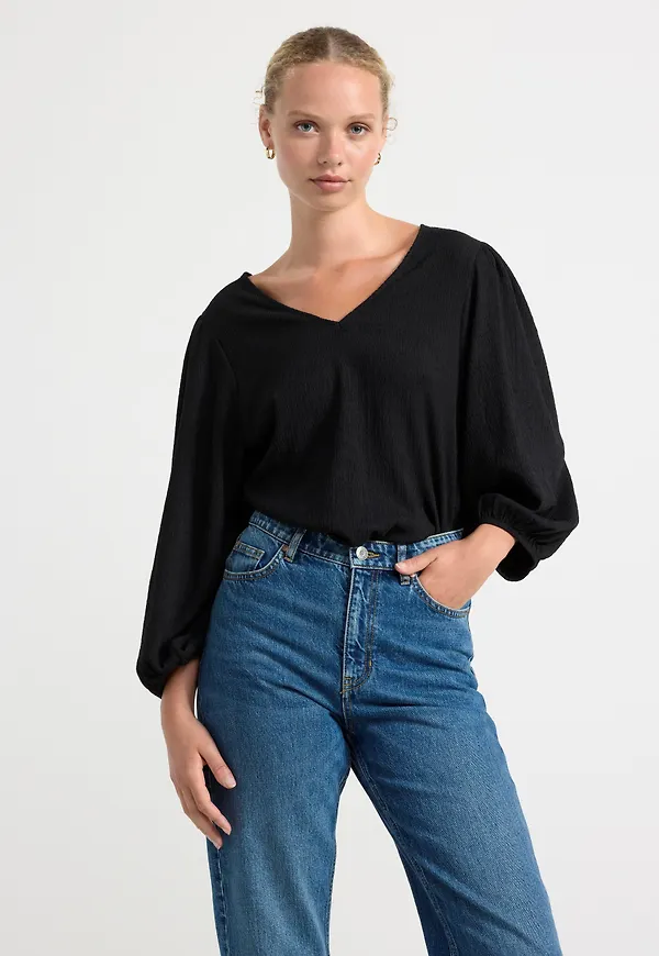 Blus med puffärm