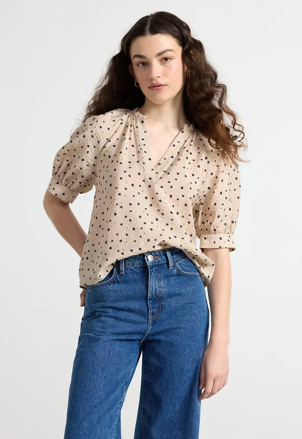 Blus med puffärmar
