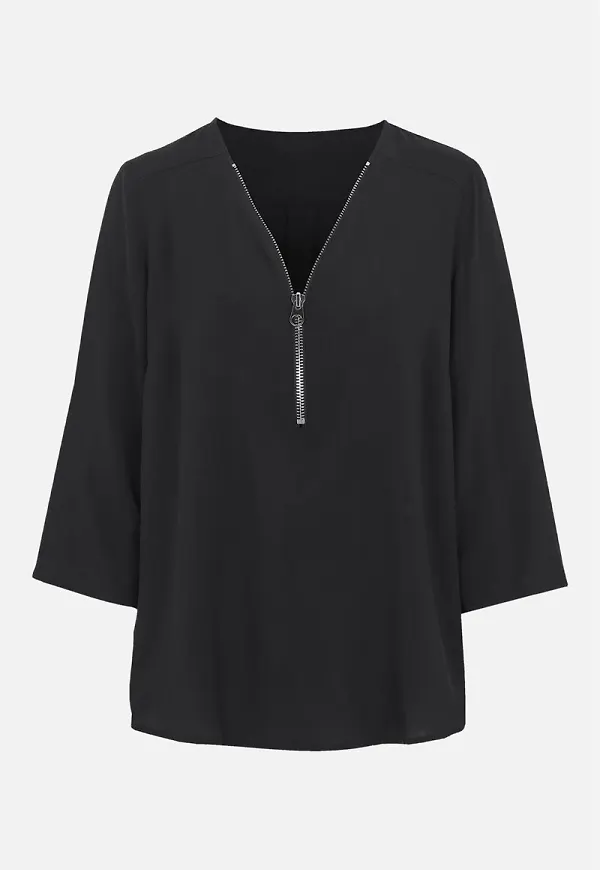 Blus med silverfärgad dragkedja