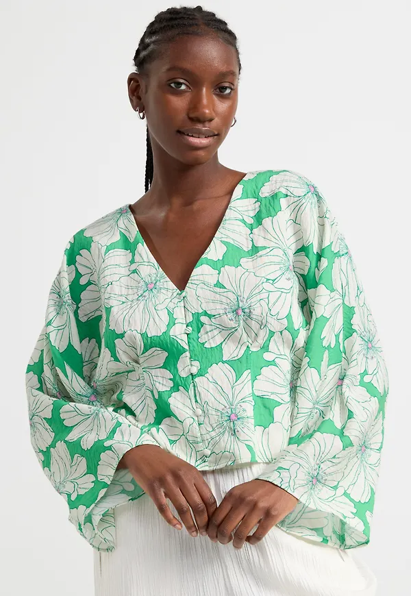 Blus med vid ärm