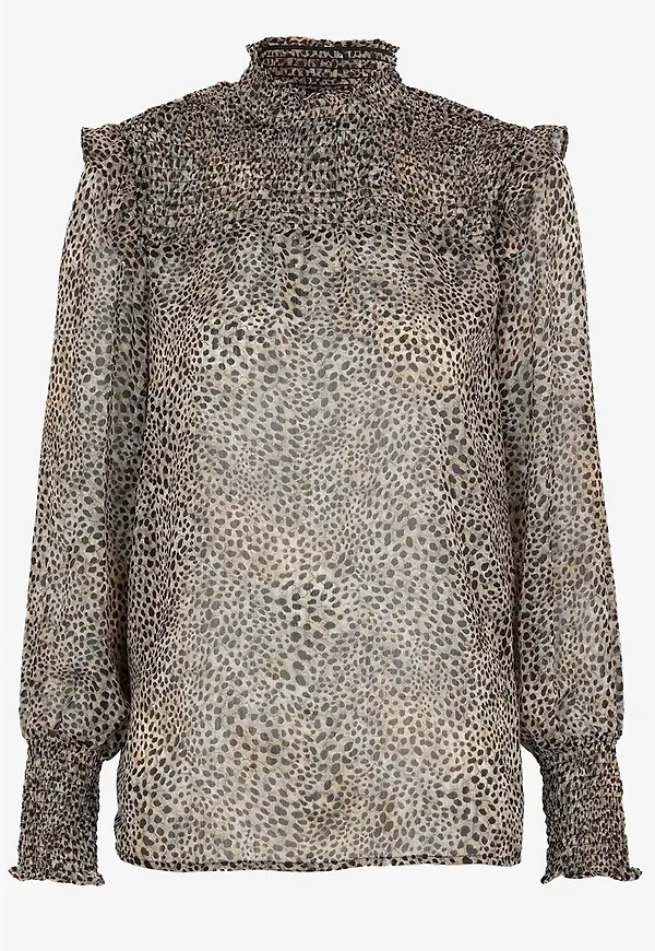 Blus Titika