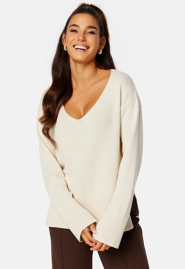BUBBLEROOM Maya v-neck slit sweater Cream M