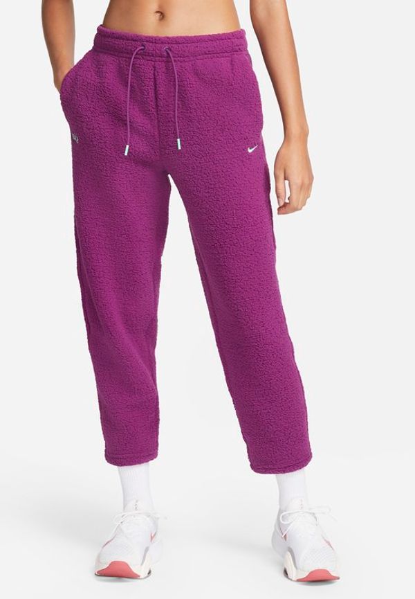 Byxor Nike Therma-FIT för kvinnor - Lila