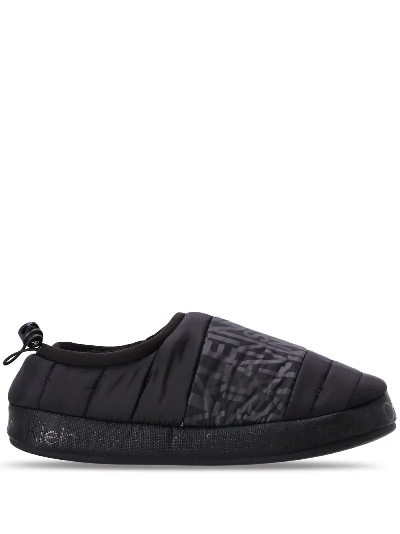 Calvin Klein quiltade tofflor med dragsko - Svart