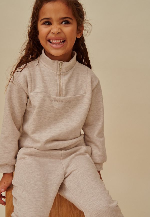Curated Styles Mini tröja med dragkedja - Beige