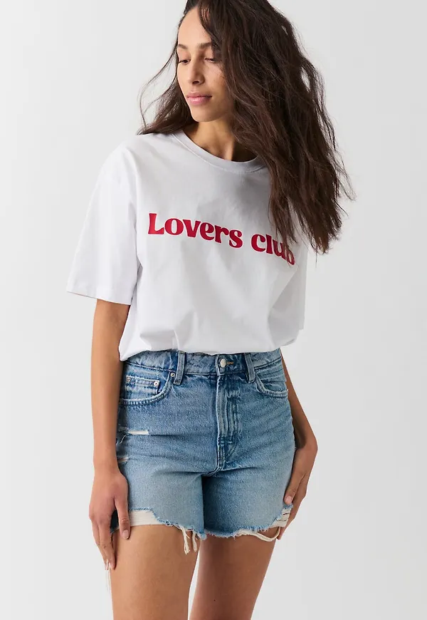 Distressed high denim shorts