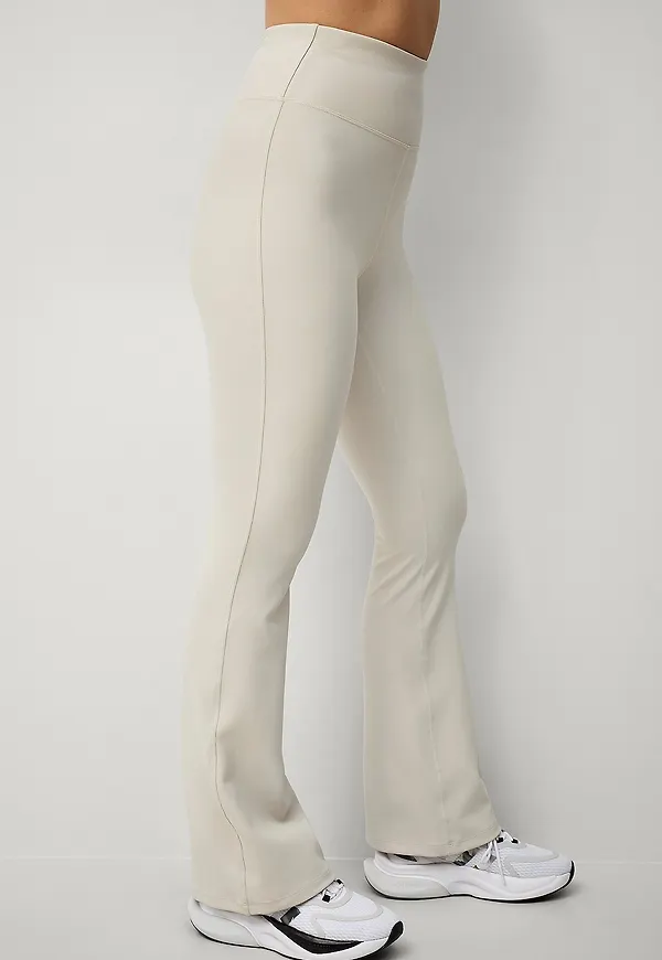 Ellos STUDIO - Träningstights Flare Structure Tights - Beige