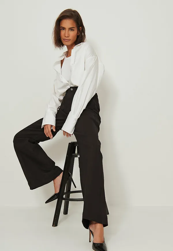 NA-KD Trend Ekologiska jeans med 70-talsvida ben och framficka - Black
