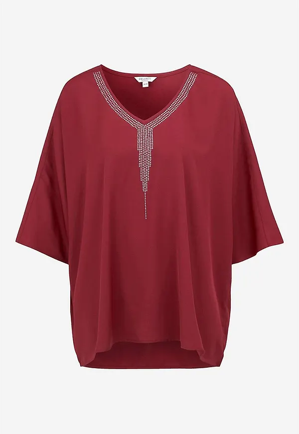 Festblus med nitdetaljer
