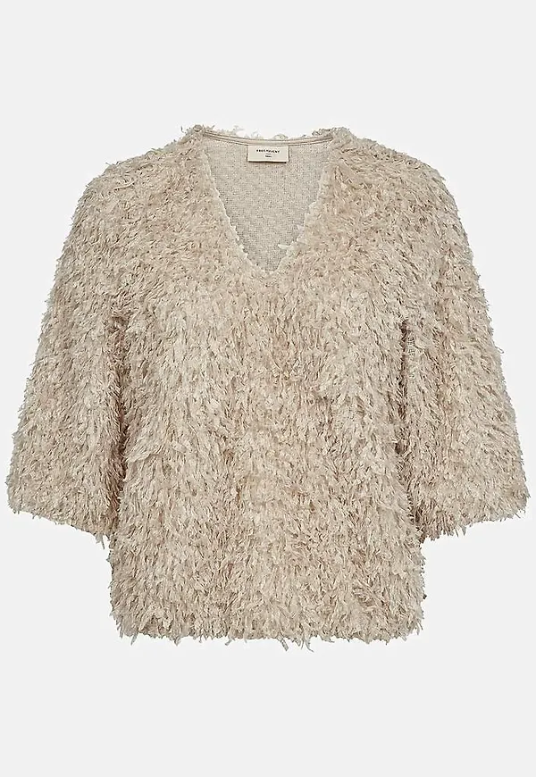 Festtopp med fjäderliknande material