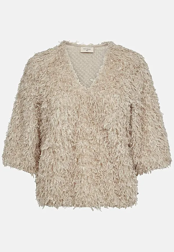 Festtopp med fjäderliknande material