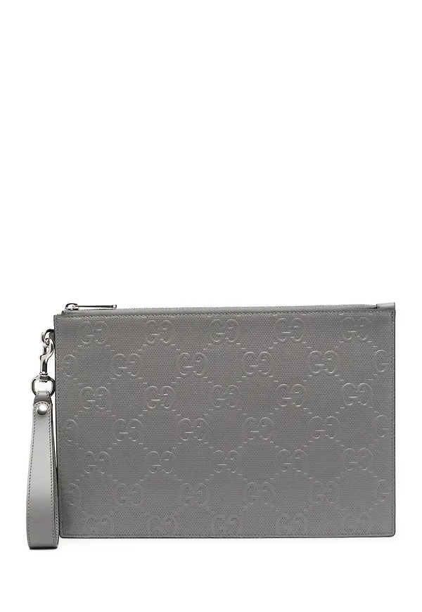 Gucci clutch med präglat monogram - Grå