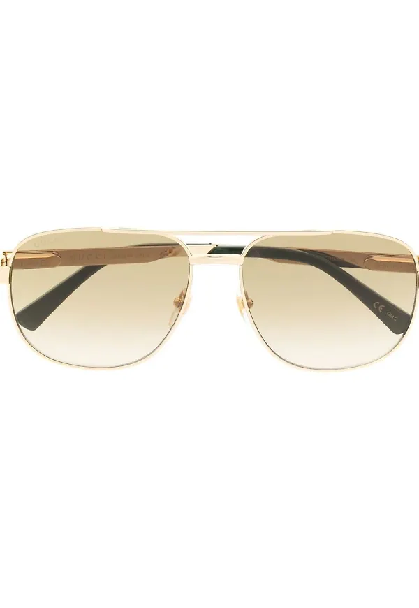 Gucci Eyewear pilotsolglasögon med graverad logotyp - Guldfärgad