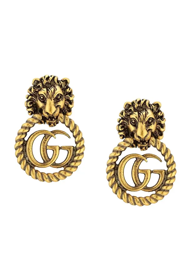 Gucci örhängen med lejonhuvud - Guldfärgad