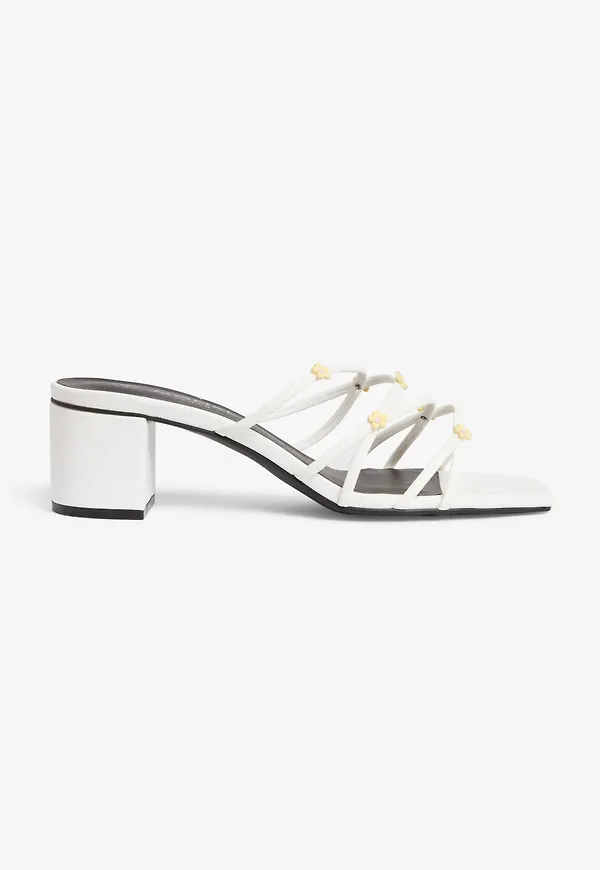 Heeled mules - White