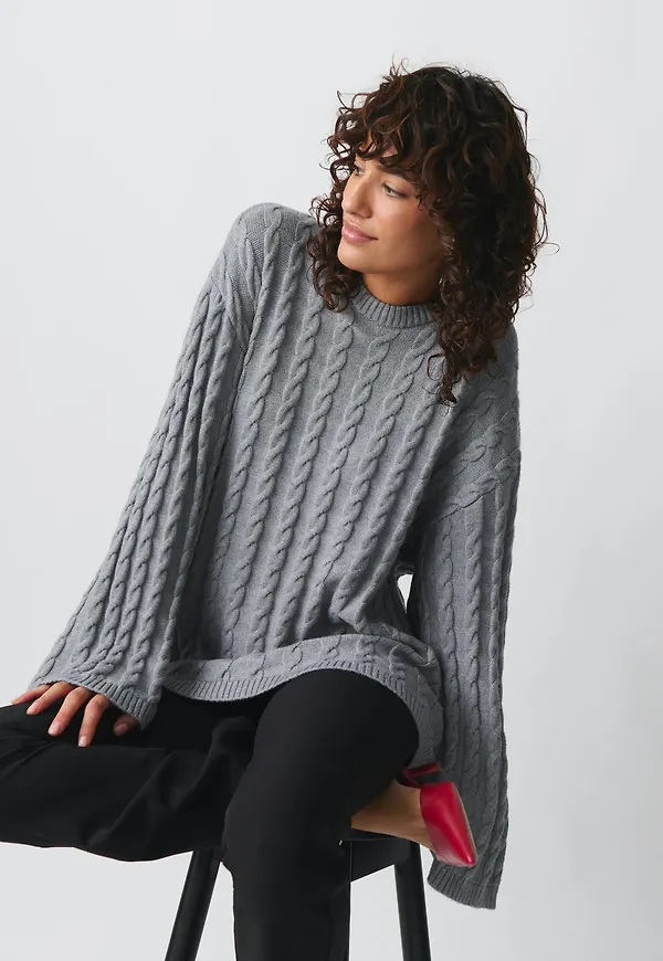Knitted cable sweater