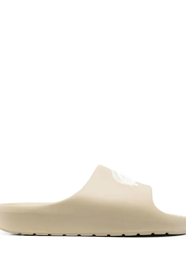 Lacoste tofflor med präglad logotyp - Neutral