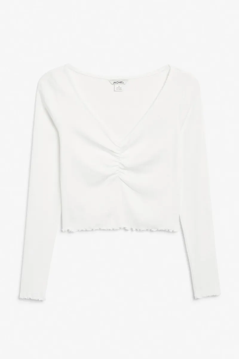 Long sleeve lettuce hem cropped top - White