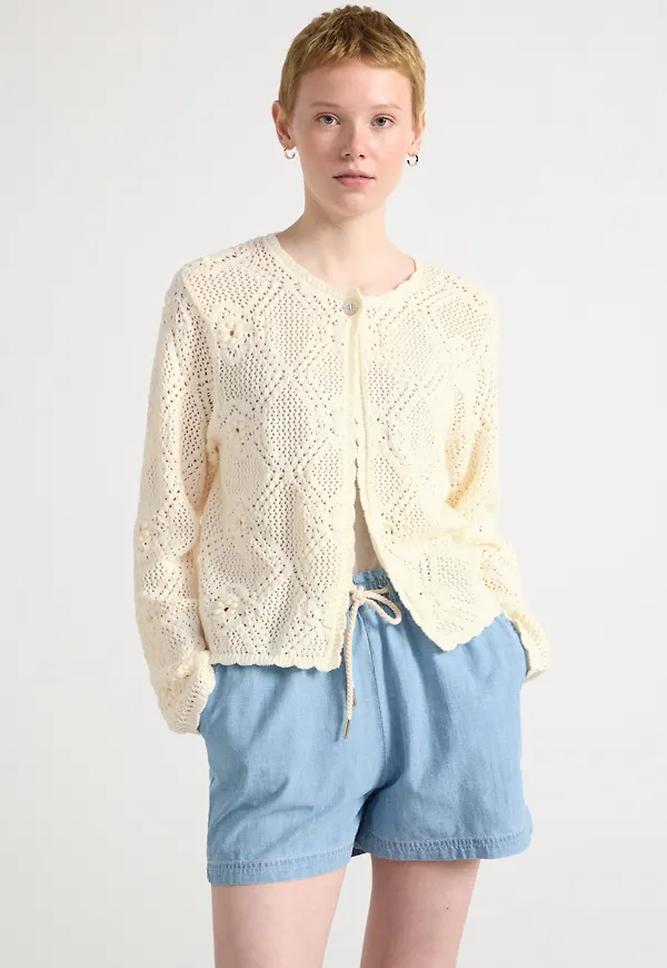 Mönsterstickad cardigan