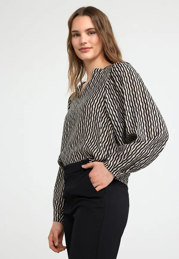 Mönstrad blus med puffärm