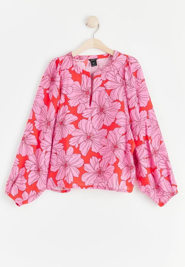 Mönstrad blus med puffärm