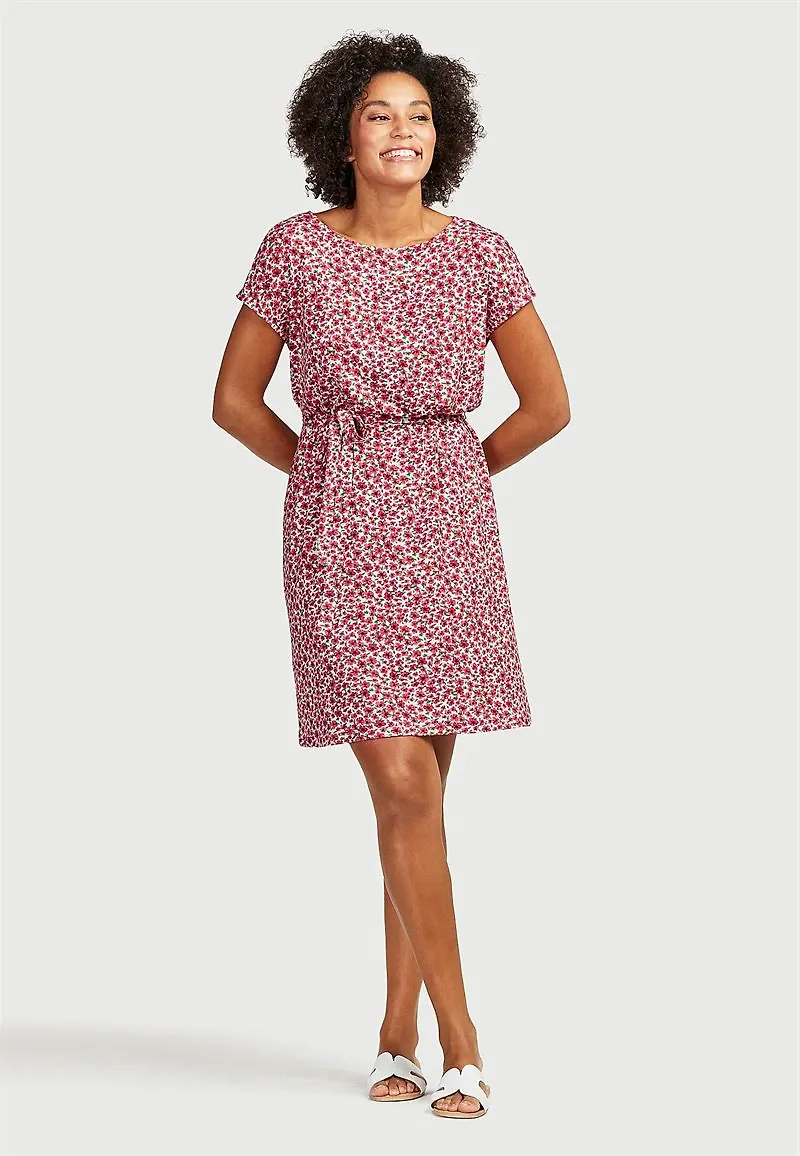 Mönstrad trikåklänning med knytband