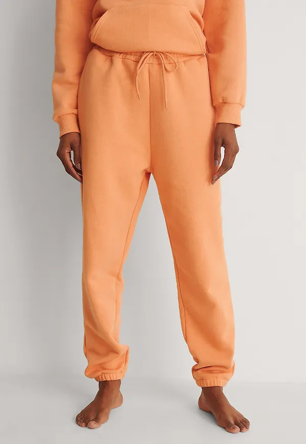 NA-KD Basic Avsmalnande sweatpants - Orange