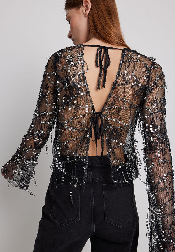 NA-KD Party Blus med paljetter och knytning fram - Black